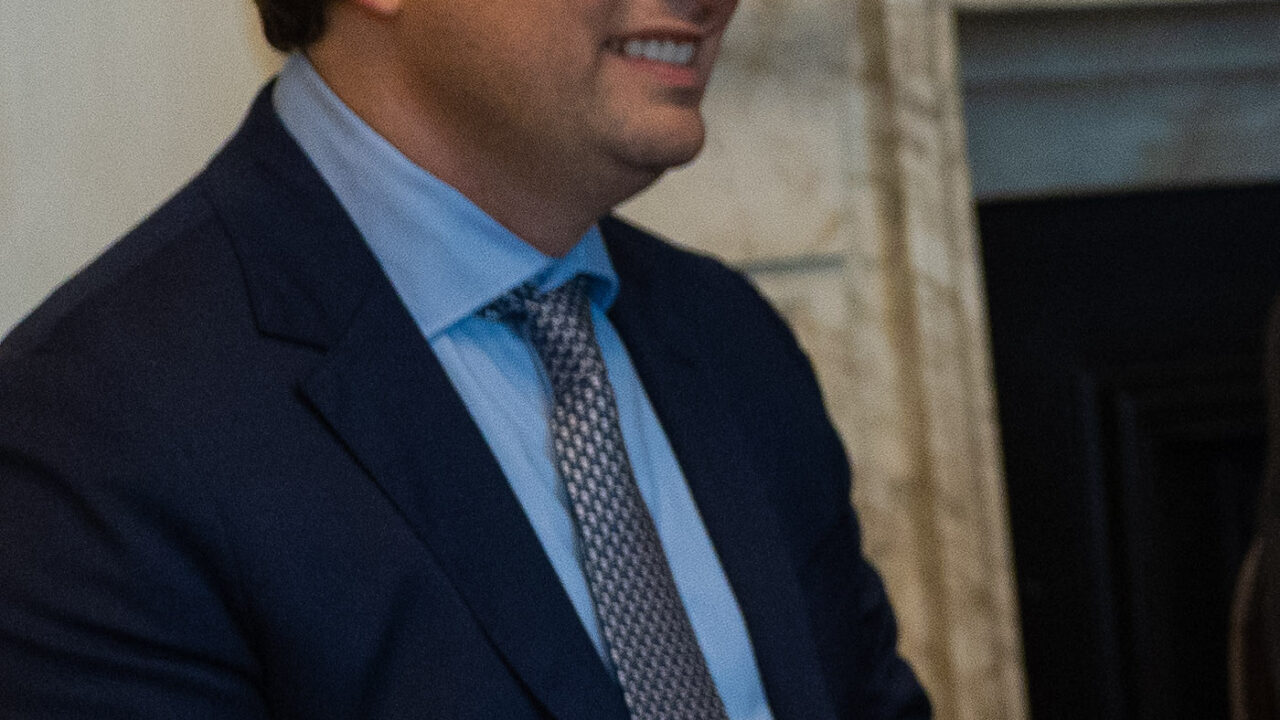 Anthropic CEO Dario Amodei speaking at a meeting