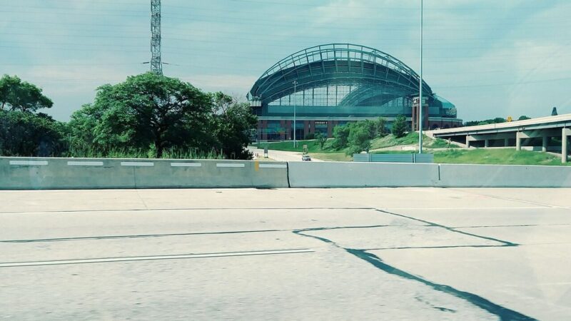 Baseball stadium exterior under a bright sky