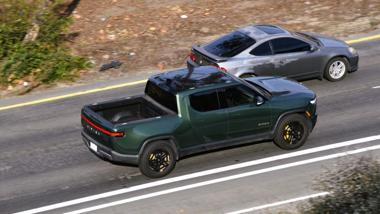 Rivian R1T electric pickup truck on a road