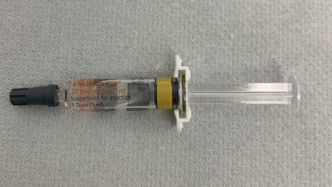 A pre-filled hepatitis B vaccine syringe lying on a clinical surface