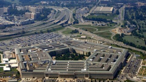 Aerial view of the Pentagon building in Arlington, Virginia, surrounded by roads and parking areas