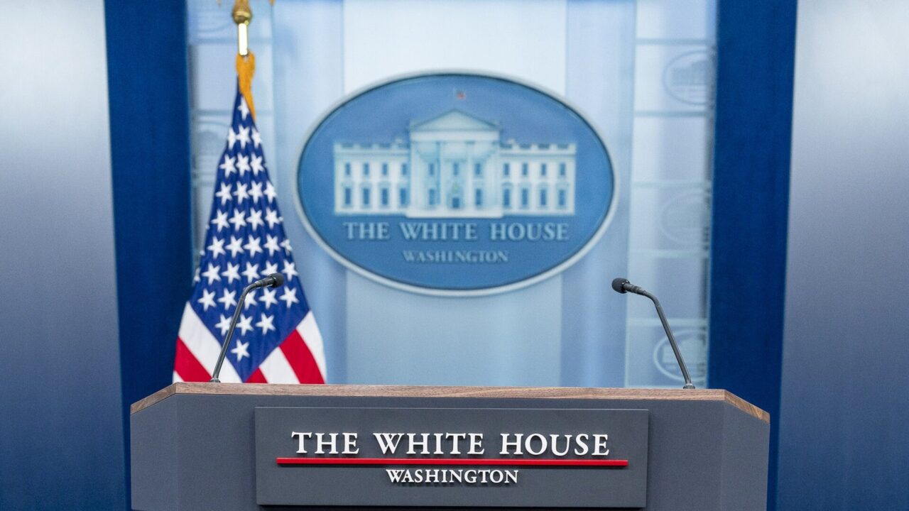 The empty podium in the James S. Brady Press Briefing Room at the White House